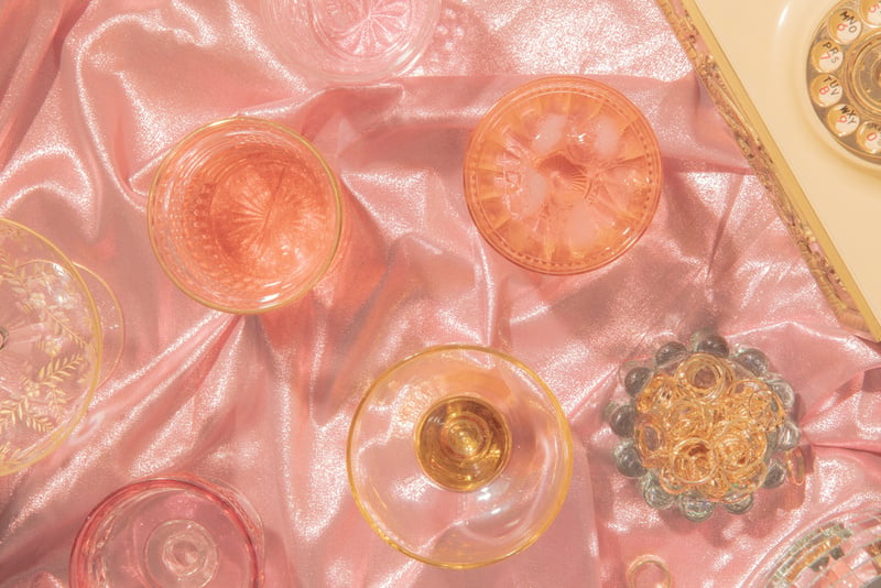 Perfume Bottles on Pink Silk
